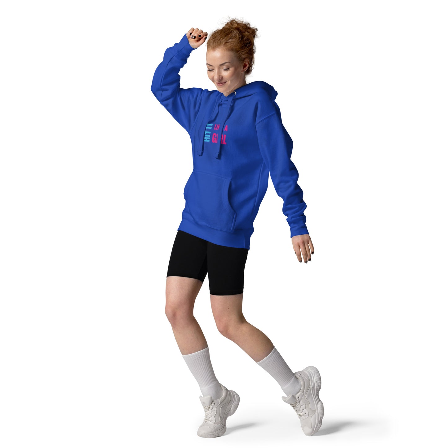 Empowered woman dancing in branded hoodie — “Hit It Like a Girl” fashion for confident movers, players, and doers.