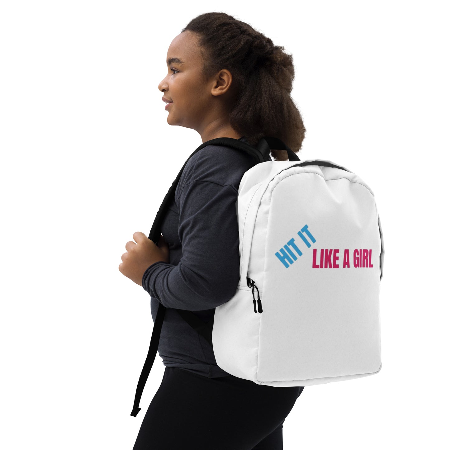 Smiling youth with white ‘Hit It Like a Girl’ backpack, showing off bold, empowering style perfect for school, sports, or everyday play.