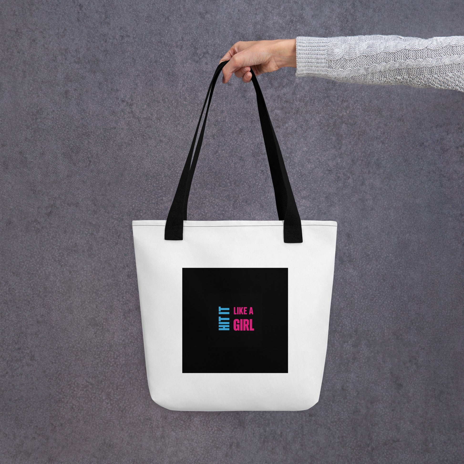 Hit It Like a Girl canvas tote with black square logo — minimalist and stylish bag for athletes, students, and game-changers.