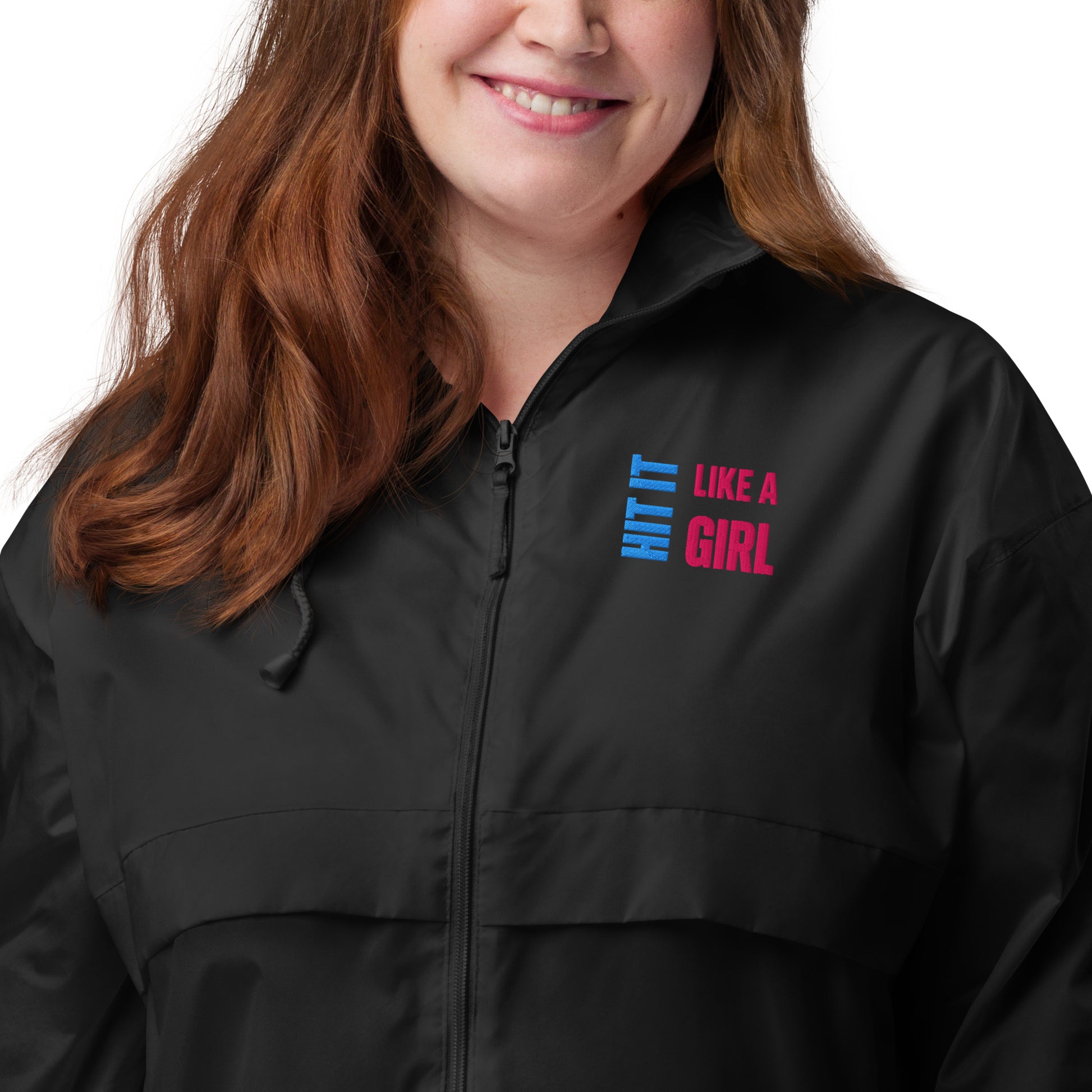 Weather-resistant athletic jacket with Hit It Like a Girl branding — empowering streetwear for active women.
