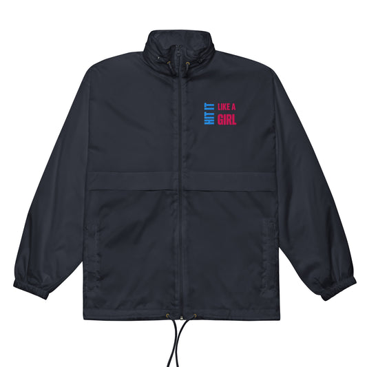 Empowering windbreaker for active women — Hit It Like a Girl navy jacket with bold pink and blue logo.