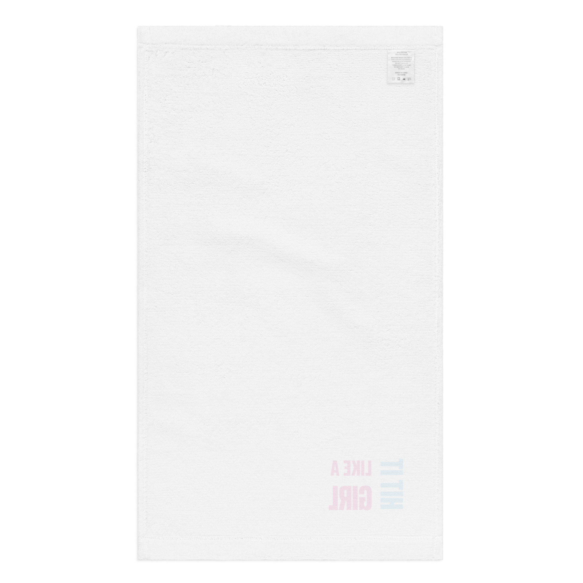 Minimalist athletic towel featuring Hit It Like a Girl branding — soft and functional accessory for confident, active women.