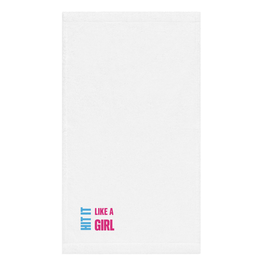 White towel with Hit It Like a Girl logo in pink and blue at the corner — bold, empowering design for gym, beach, or courtside.