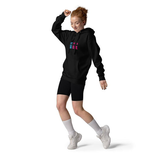 Confident woman rocking Hit It Like a Girl hoodie and sporty style — empowering female sportswear for everyday athletes.