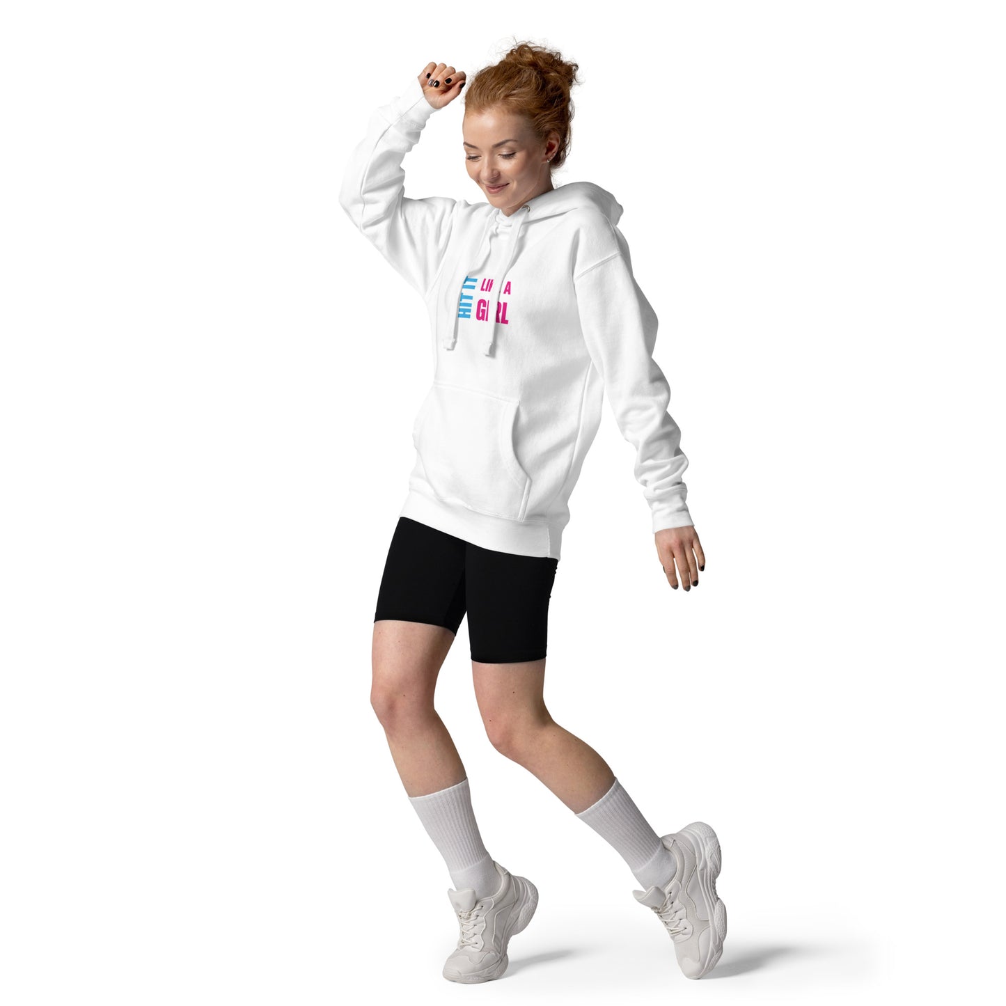 Fierce female energy in white hoodie with “Hit It Like a Girl” text — athletic loungewear for women who move with purpose.